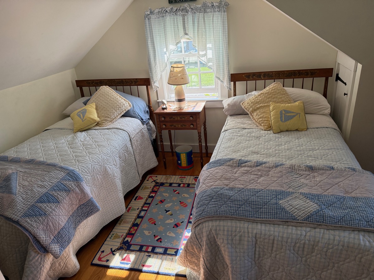 Twin bedroom with nautical decor