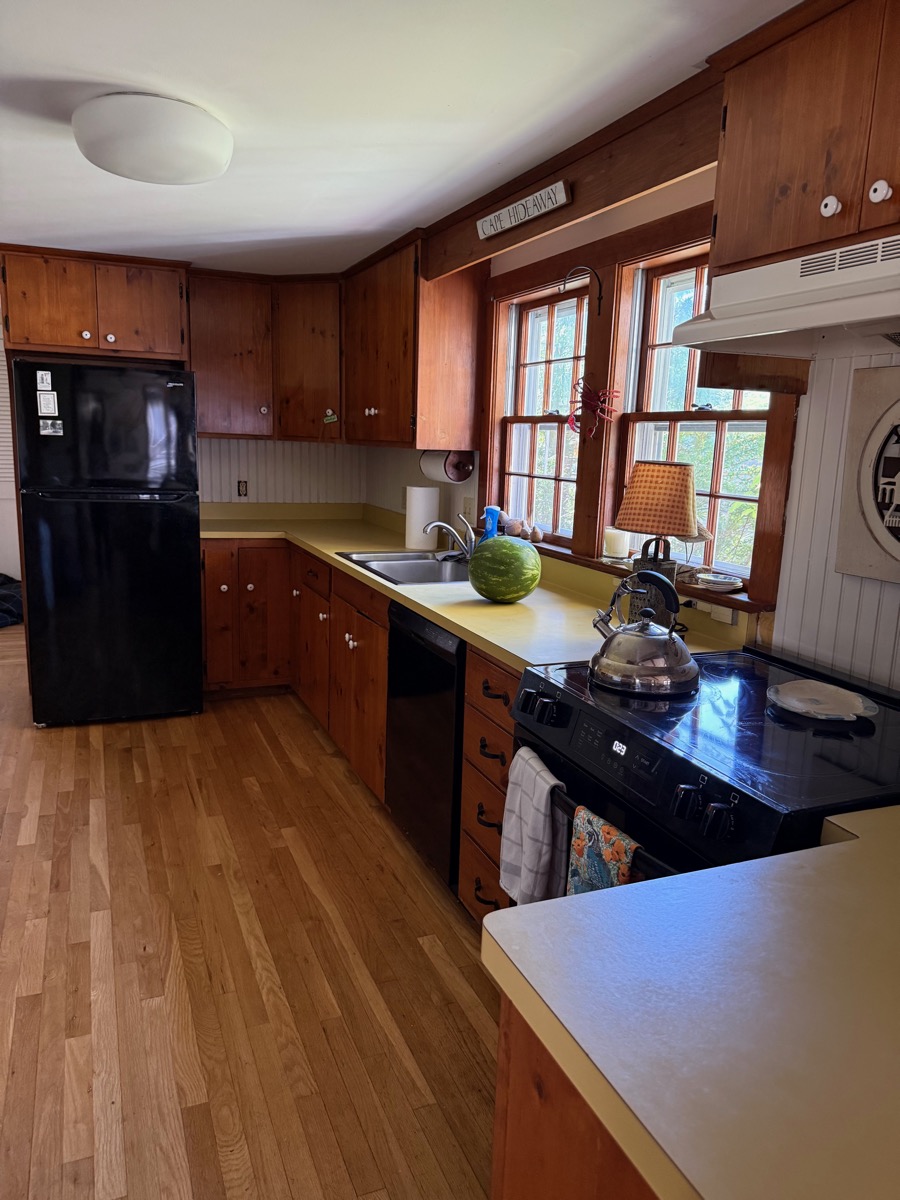 Kitchen with knotty pine cabinets